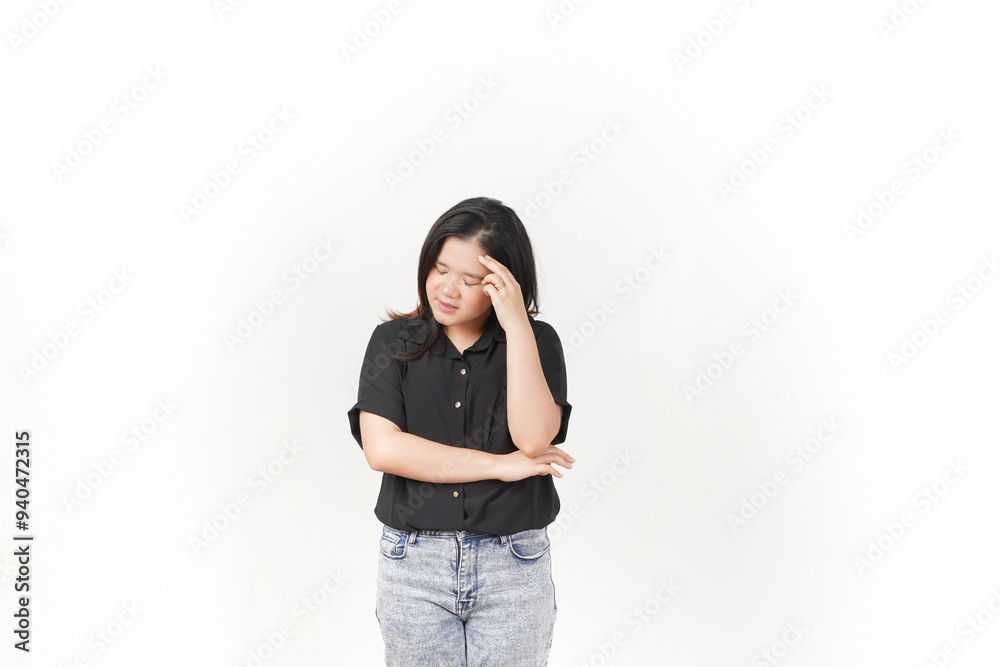Young Asian woman suffering headache, hand on head wearing Black t-shirt and jeans isolated on white background Young Asian woman suffering headache, hand on head wearing Black t-shirt and jeans isolated on white background