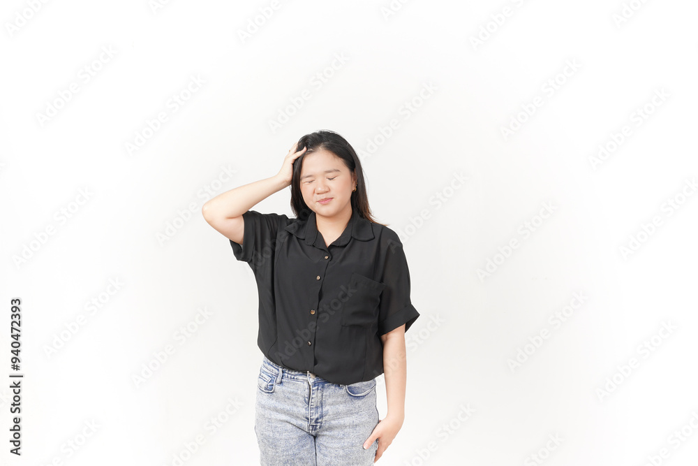 Young Asian woman suffering headache, hand on head wearing Black t-shirt and jeans isolated on white background Young Asian woman suffering headache, hand on head wearing Black t-shirt and jeans isolated on white background