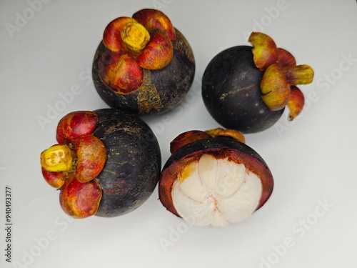 mangosteens on a white background.