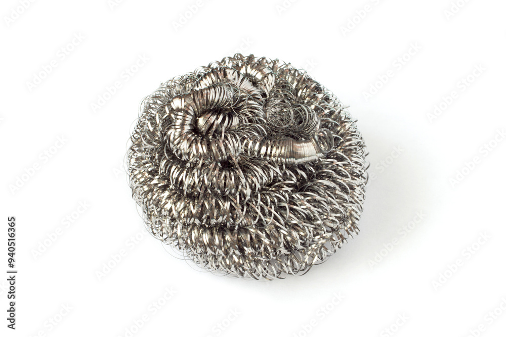 Metal cookware scraper on a white background. Universal metal scraper. Metal cookware scraper on a white background. Universal metal scraper.