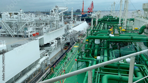 LNG ship in the terminal unloading of natural liquefied gas. Energy supply