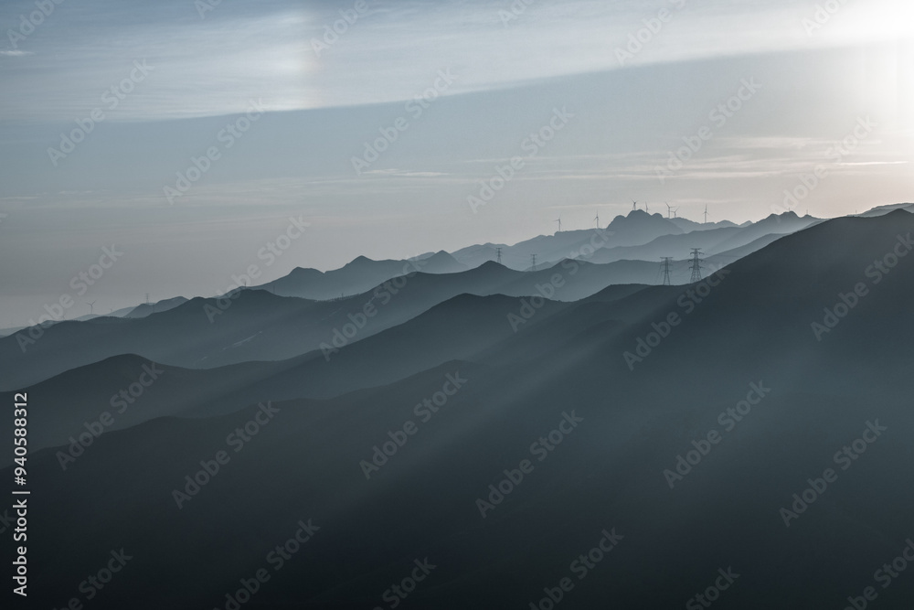 Fototapeta premium view of green hill at sunrise