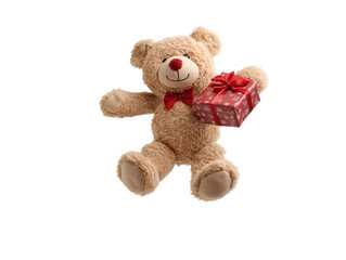 photo of a soft cotton teddy bear holding a christmas gift floating in mid-air on isolated background
