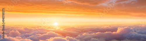 A breathtaking view of the sunset over the clouds, capturing vibrant colors and serene beauty in the sky.