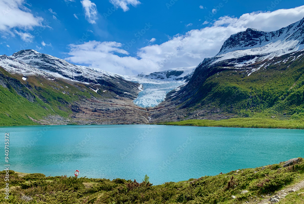 The Engabreen glacier arm, part of Svartisen glacier in Norway, with the Svartisvannet lake in front. The Engabreen glacier arm, part of Svartisen glacier in Norway, with the Svartisvannet lake in front.