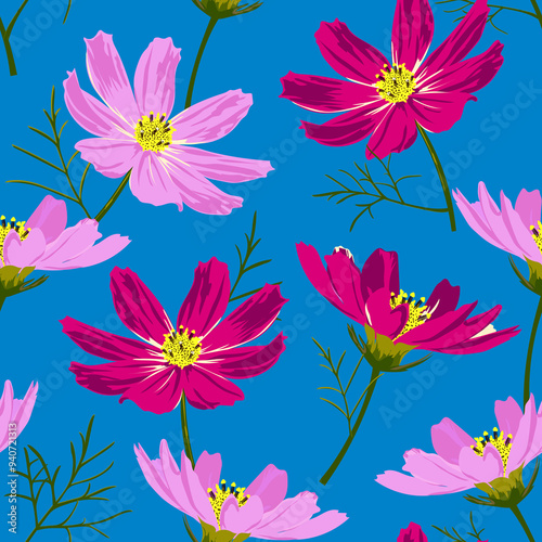 Small pink and purple graceful cosmos flowers on a blue background form a seamless pattern. 