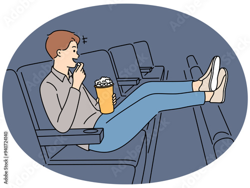 Happy man with popcorn watch movie