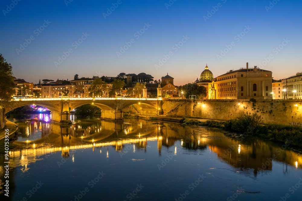 View of Basilica of St. Peter's in Vatican and Bridge of Angels at blue hour View of Basilica of St. Peter's in Vatican and Bridge of Angels at blue hour