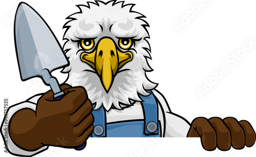 An eagle bricklayer builder construction worker mascot cartoon character holding a trowel tool and peeking over a sign