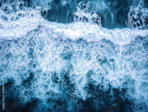 An Aerial View Capturing the Patterns of Waves Crashing Along the Shoreline