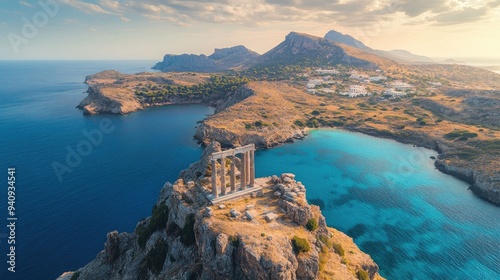 A stunning aerial perspective of Kolona Hill, with the Temple of Apollo single pillar overlooking the azure waters of Aigina Island.