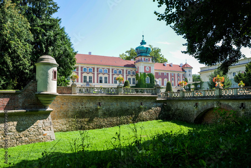 Obraz na płótnie Beautiful castle in Łańcut on a sunny day. Defensive walls in the foreground w salonie