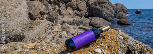 Bottle of wine by the sea