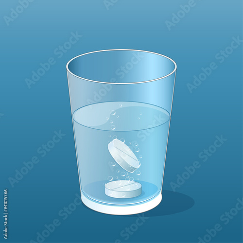 Glass of water with two effervescent tablets dissolving
