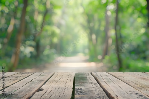 Wooden table in a serene forest setting with bokeh effect.