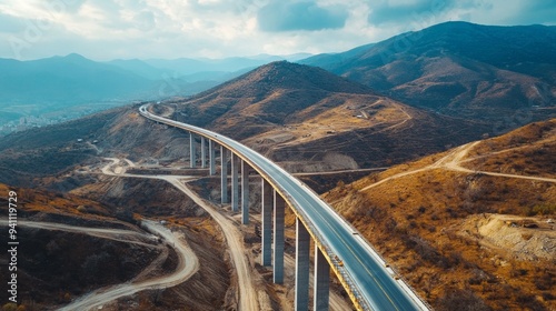 Wallpaper Mural Elevated highway winding through mountainous terrain on a clear day Torontodigital.ca