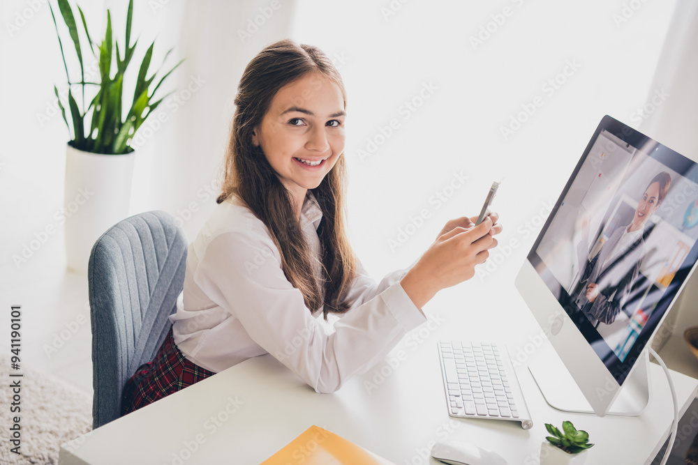 Photo portrait of teen cute daughter computer online hold gadget wear uniform remote education home schooling isolated indoors background Photo portrait of teen cute daughter computer online hold gadget wear uniform remote education home schooling isolated indoors background