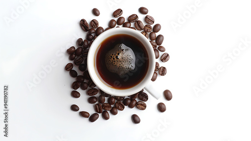 A top view of a coffee cup accompanied by roasted coffee beans, on a seamless white background