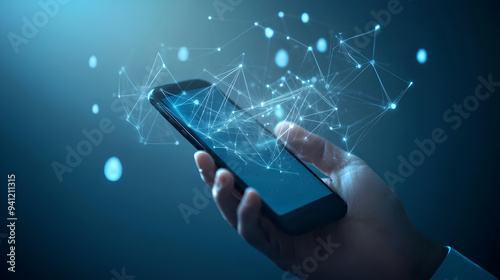 Businessman's hand using smartphone with network connection on blue background. Technology concept