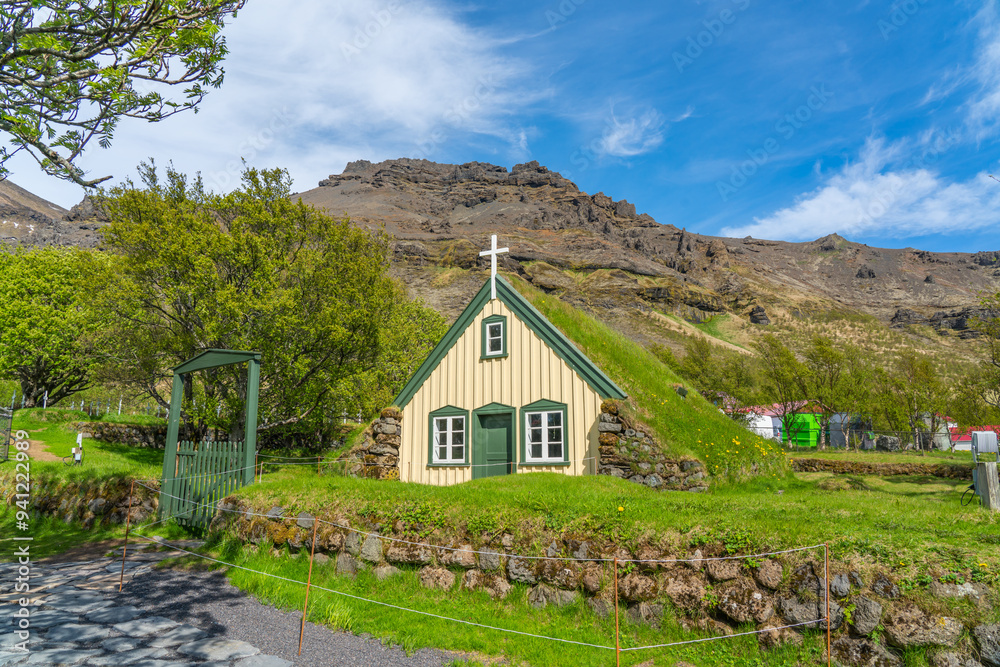Historic turf Church Hofskirkja in the small village of Hof, Iceland. Hofskirkja Hof, scene with turf roof church in old Iceland traditional style Historic turf Church Hofskirkja in the small village of Hof, Iceland. Hofskirkja Hof, scene with turf roof church in old Iceland traditional style