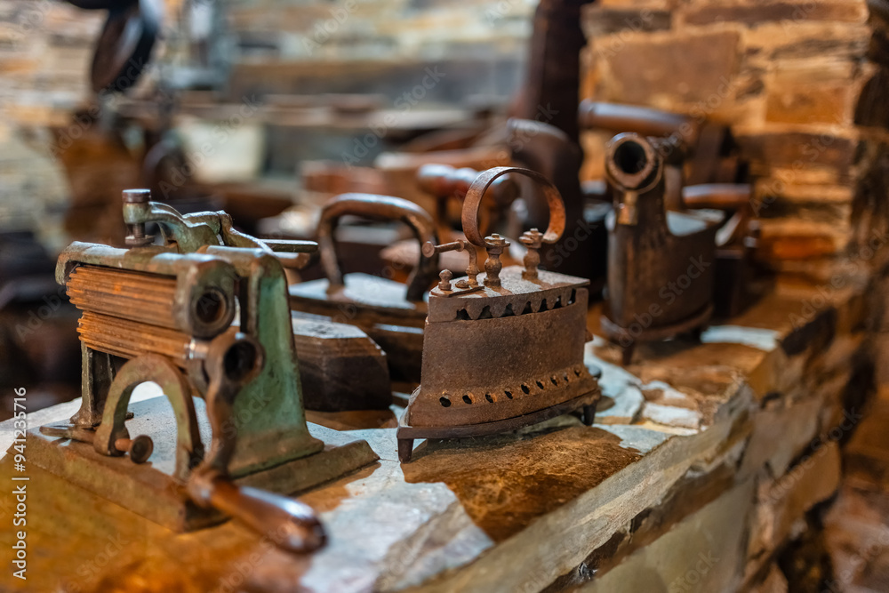 Very old irons used to iron clothes in the villages of Spain. Very old irons used to iron clothes in the villages of Spain.