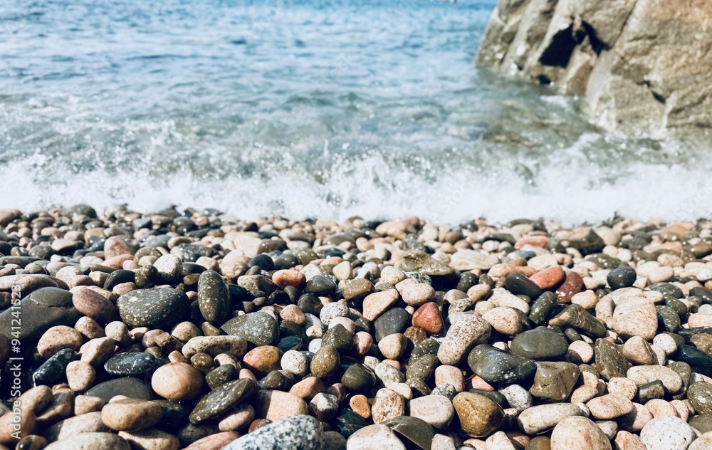 Pebble beach on the sand in the Mediterranean Sea. Pebble beach on the sand in the Mediterranean Sea.