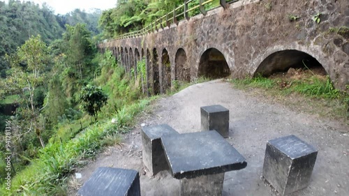 Old stone bridge at Plunyon, Kalikuning, Cangkringan, Sleman, Yogyakarta, Indonesia. photo