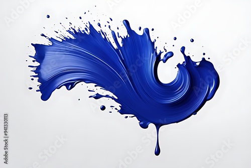 Dark blue paint splash with drops isolated on a white background. Abstract liquid indigo color splash with smooth texture. Design for posters, banners, and artistic projects photo