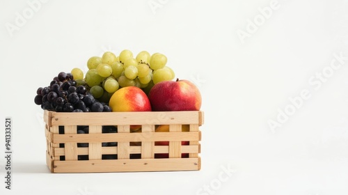 folorful fruits in wooden basket on the white background photo