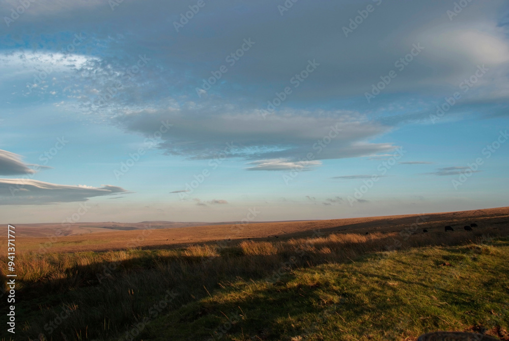 Exmoor Landscape. A view across Exmoor shortly before dusk. Beautiful cloudy blue sky. Exmoor Landscape. A view across Exmoor shortly before dusk. Beautiful cloudy blue sky.