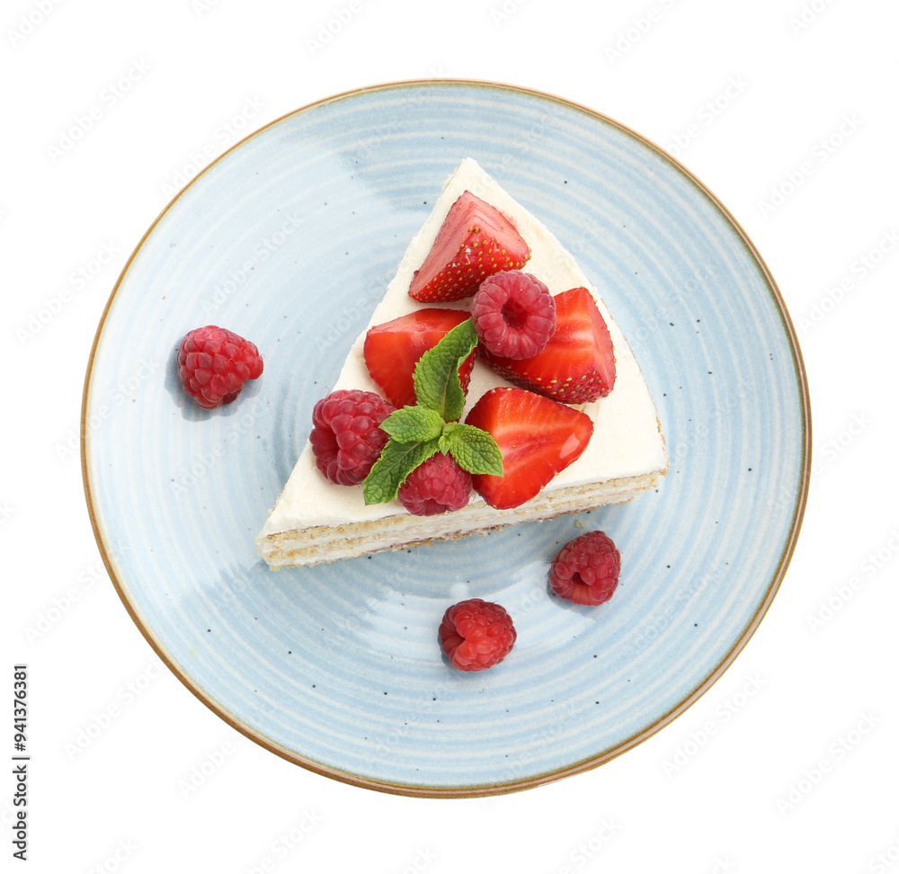 Piece of tasty sponge cake with fresh berries and mint isolated on white, top view Piece of tasty sponge cake with fresh berries and mint isolated on white, top view