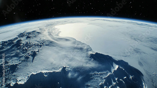An Earth world cold planet seen from space ice glacier covered aerial view looking down on Antarctica