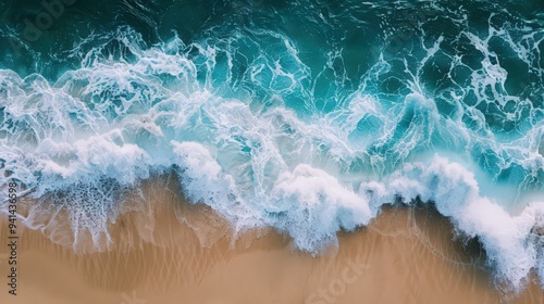 Ocean waves crashing against a pristine beach, reminding us of the importance of protecting our coastlines.