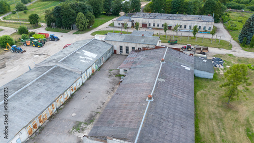 Drone photography of an old indoor chicken factory during summer day