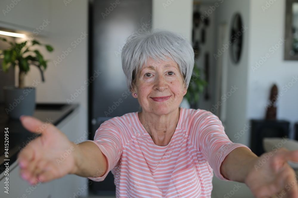 Senior woman asking someone to come with arms and hands gesture Senior woman asking someone to come with arms and hands gesture