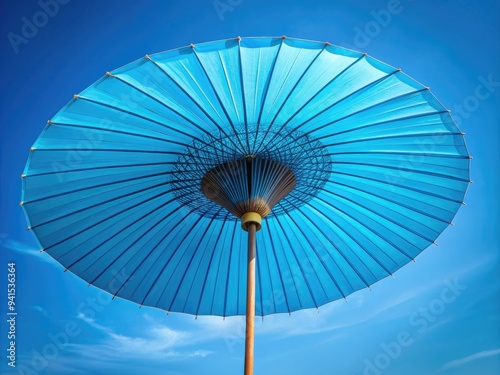 Azure Parasol: Contemporary, Protective, Ocean Blue, Upward Movement photo