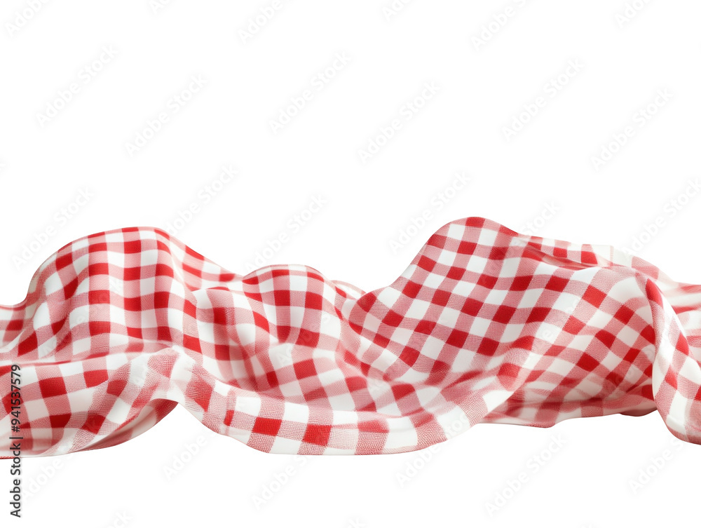 Fototapeta premium Red and white checkered fabric draped on white background, soft and flowing.