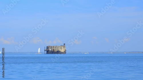 Fort boyard seen from Boyardville beach on a sunny day in Charente-Maritime, France photo