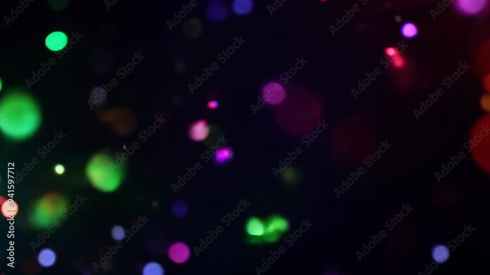 Colorful particles swirling in a dark background with vibrant effects during a creative art session Colorful particles swirling in a dark background with vibrant effects during a creative art session