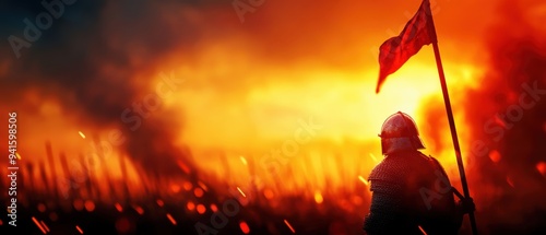 Epic battle scene at sunset with a knight holding a flag, surrounded by smoke and fire, symbolizing medieval warfare and bravery. photo