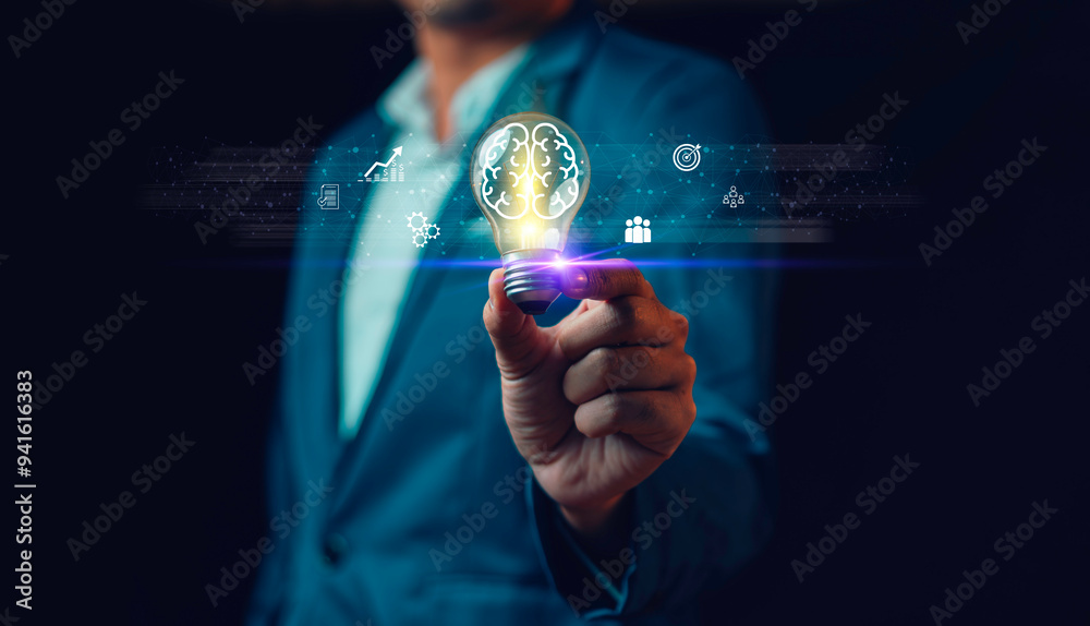 Hand of man holding illuminated light bulb, Idea innovation and inspiration concept. new ideas Great inspiration and innovation new beginning