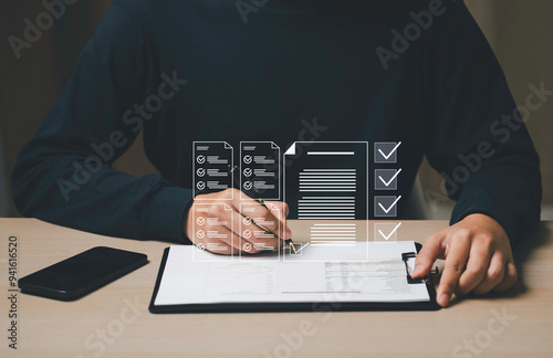 Obraz na płótnie check electronic documents,Document management concept, check electronic documents digital documents on virtual screen Document Management System and process automation to efficiently document operate w salonie
