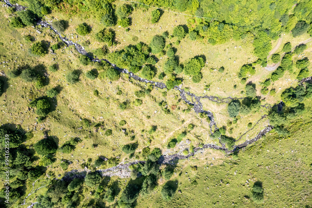 Aerial View of Mountainous Terrain with Stream Aerial View of Mountainous Terrain with Stream
