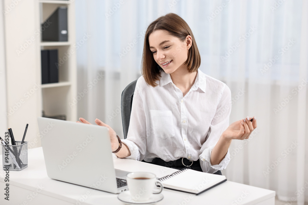 Teenager having video chat via laptop at home. Remote work Teenager having video chat via laptop at home. Remote work