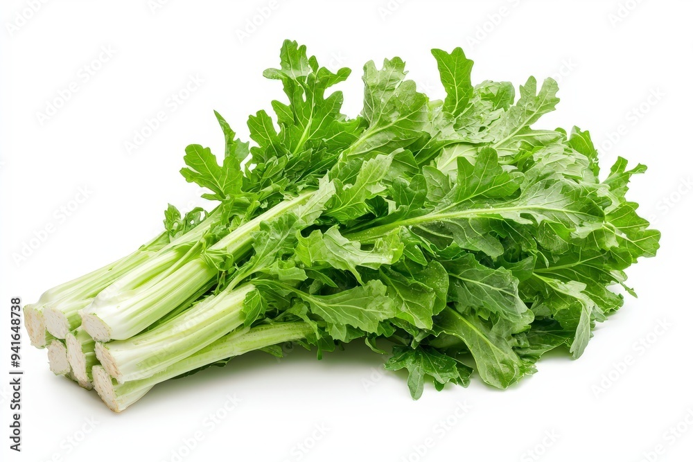 A bunch of fresh green celery with leafy tops, ideal for salads and cooking. A bunch of fresh green celery with leafy tops, ideal for salads and cooking.