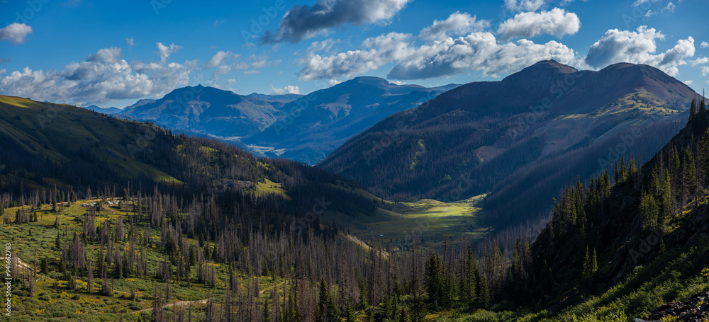 Early morning mountain valley clouds and dramatic lighting Early morning mountain valley clouds and dramatic lighting