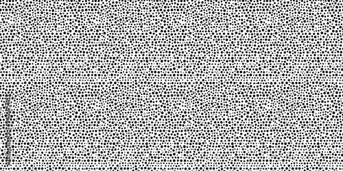 Grey dot texture pattern with a subtle, minimalist design. seamless background pattern
