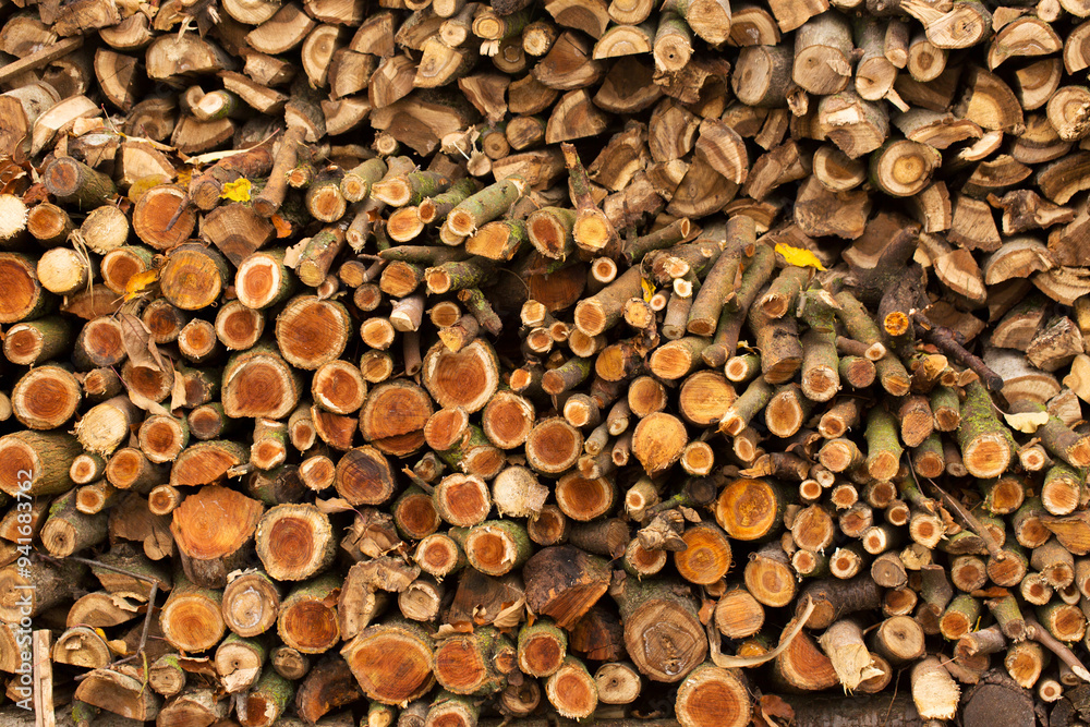 Chopped firewood is prepared for heating in winter Chopped firewood is prepared for heating in winter