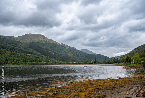 Landscape photography of lake Loch Long and mountains; moody sky with clouds; hill; viewpoint; scenic; rocky; destination; travel; hiking; hike; Scotland; UK; Arrochar