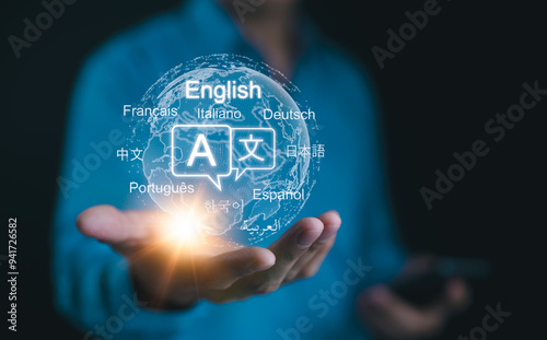 Multilingual Language Translation Technology Concept. A person holding holographic globe with speech bubbles and various languages, represents global language translate and multilingual communication. photo